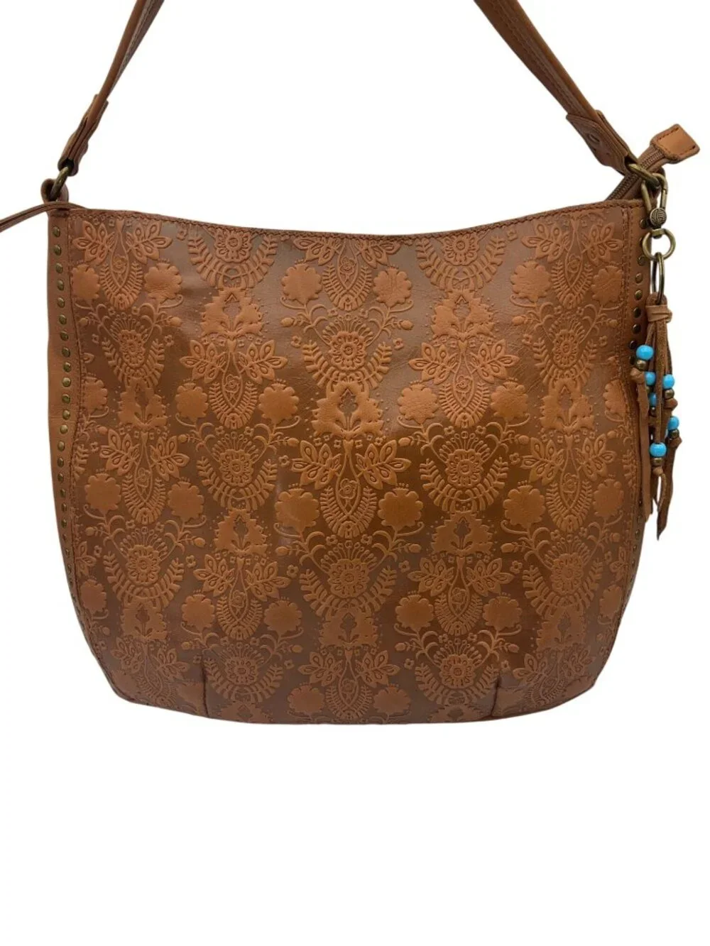 The Sak Leather Hobo Indio Floral Tooled Slouchy Tan Shoulder Bag Tassel Charm
